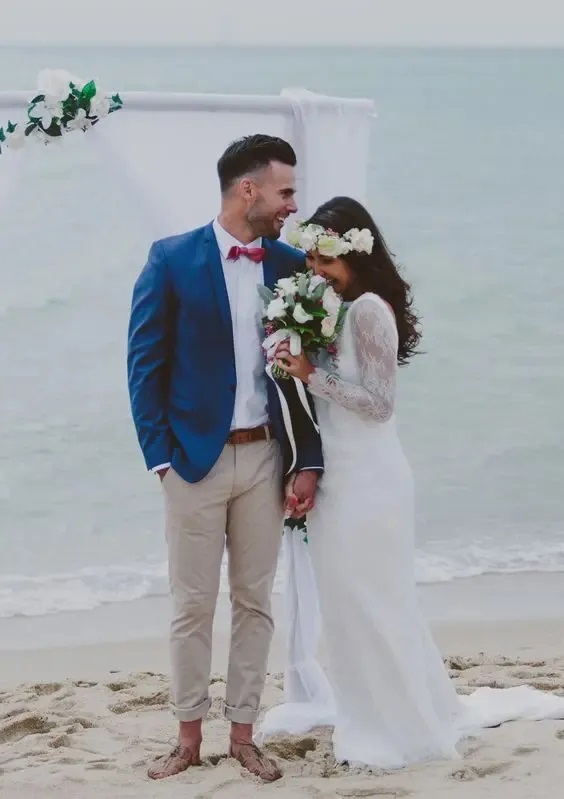 groom dressed for the beach wedding